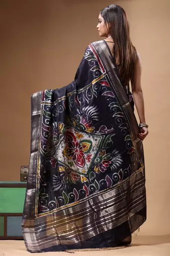 elegant black silk blend saree with hand-painted floral art & rich golden zari border
