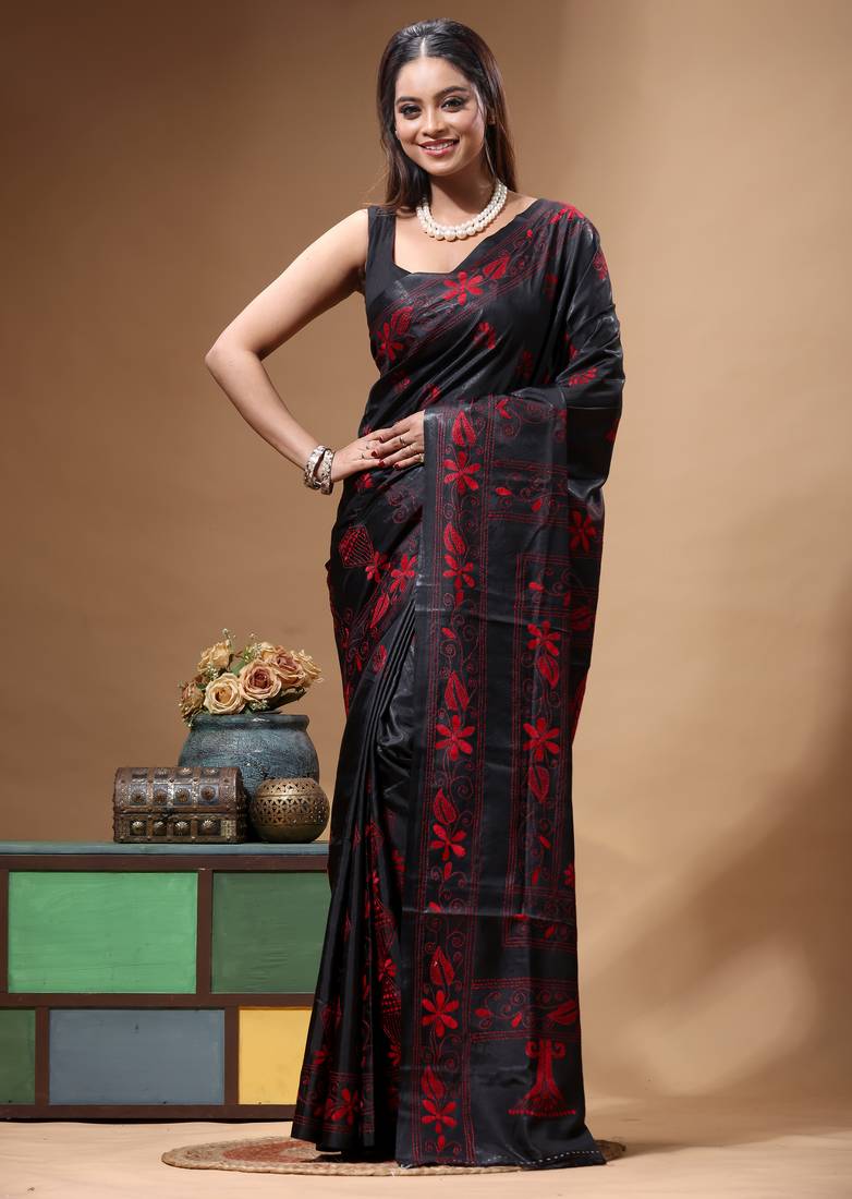 black silk blend stitch saree with red hand-embroidered floral pallu