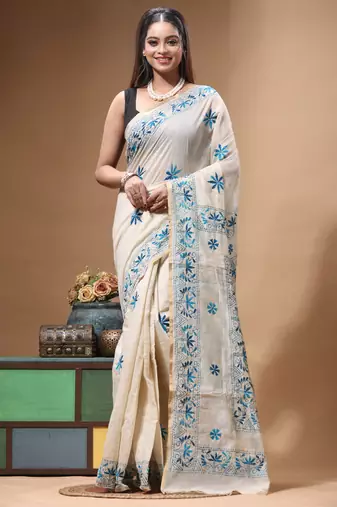 off-white cotton blend saree with blue floral embroidered stitched saree