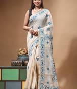 off-white cotton blend saree with blue floral embroidered stitched saree
