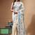 off-white cotton blend saree with blue floral embroidered stitched saree