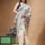 off-white cotton blend saree with blue floral embroidered stitched saree
