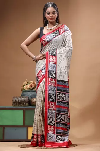 elegant off-white printed silk blend saree with red & black artistic border