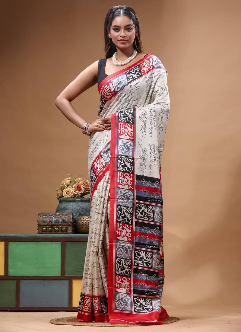 elegant off-white printed silk blend saree with red & black artistic border