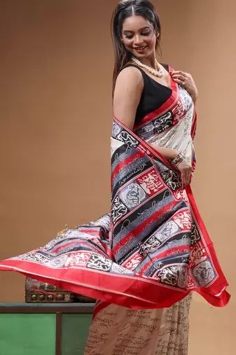 elegant off-white printed silk blend saree with red & black artistic border