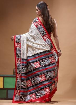 elegant off-white printed silk blend saree with red & black artistic border 3