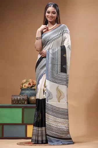 elegant black & off-white printed silk blend saree with geometric & leaf motif