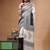elegant black & off-white printed silk blend saree with geometric & leaf motif