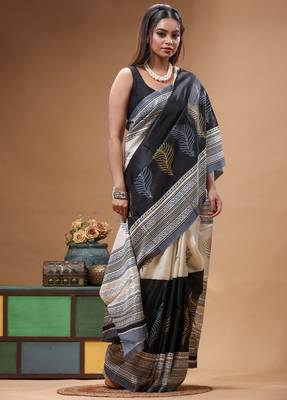 elegant black & off-white printed silk blend saree with geometric & leaf motif 2