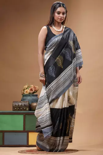 elegant black & off-white printed silk blend saree with geometric & leaf motif