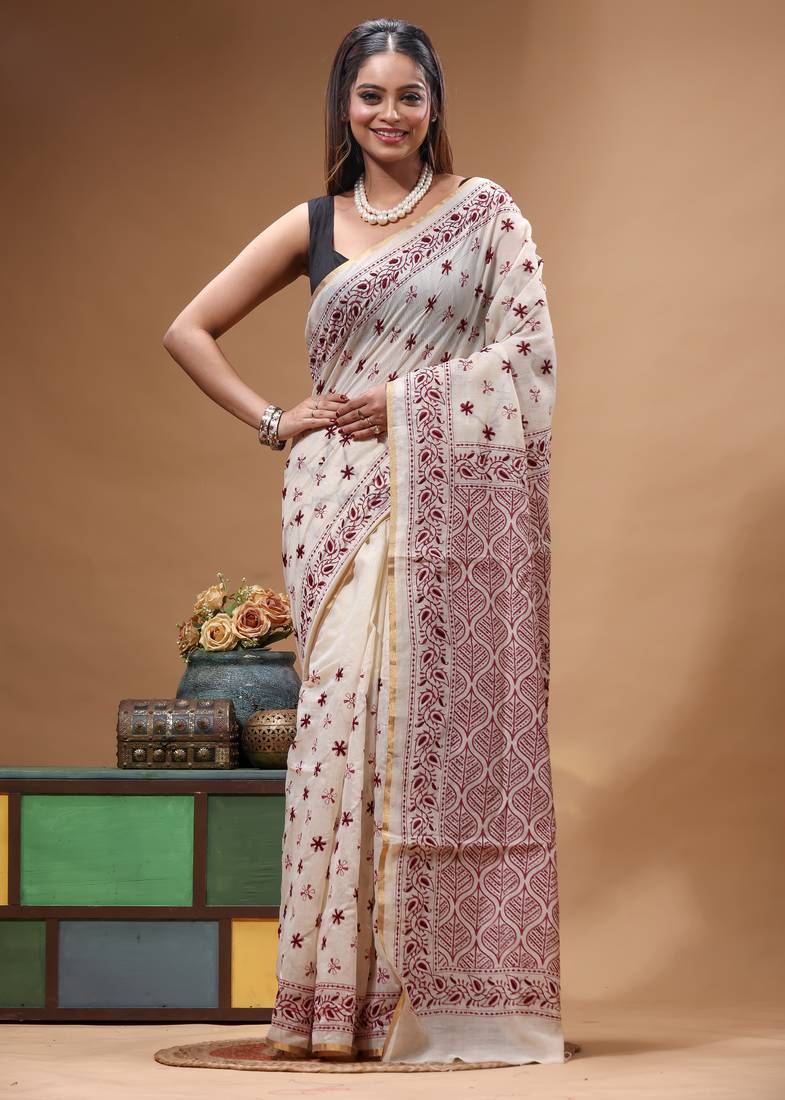 off-white cotton blend saree with magenta floral embroidered stitched saree