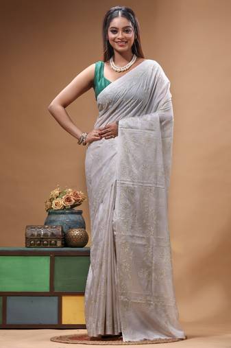 offwhite silk blend stitch saree with self hand-embroidered floral pallu