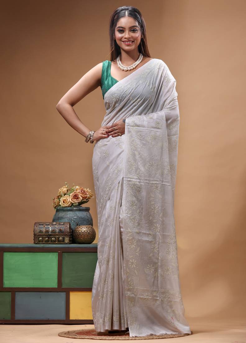 offwhite silk blend stitch saree with self hand-embroidered floral pallu