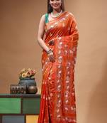 fire orange silk blend stitch saree with offwhite hand-embroidered floral pallu