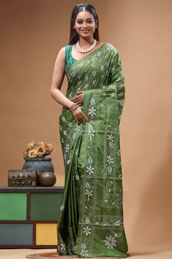 green silk blend stitch saree with offwhite hand-embroidered floral pallu