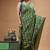 green silk blend stitch saree with offwhite hand-embroidered floral pallu