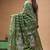 green silk blend stitch saree with offwhite hand-embroidered floral pallu