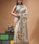 off-white cotton blend saree with olive green floral embroidered stitched saree