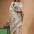 off-white cotton blend saree with olive green floral embroidered stitched saree