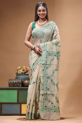 off-white cotton blend saree with teal green floral embroidered stitched saree