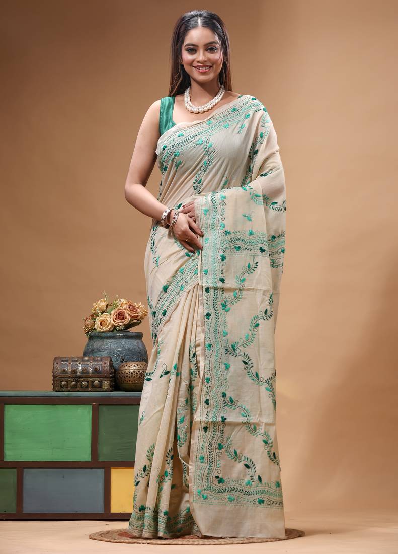 off-white cotton blend saree with teal green floral embroidered stitched saree