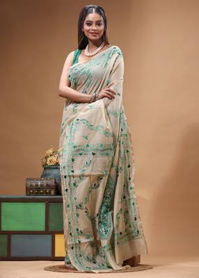 off-white cotton blend saree with teal green floral embroidered stitched saree 2