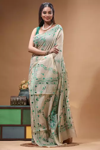 off-white cotton blend saree with teal green floral embroidered stitched saree