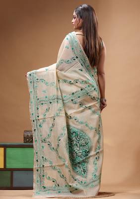 off-white cotton blend saree with teal green floral embroidered stitched saree 3