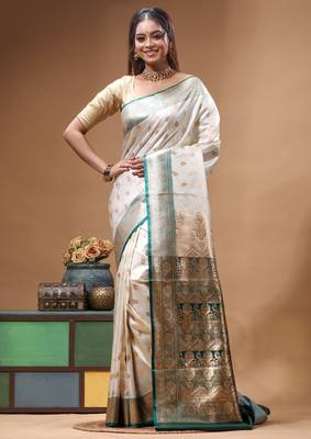Off-white katan silk saree with gold zari woven border & green contrasting border 1