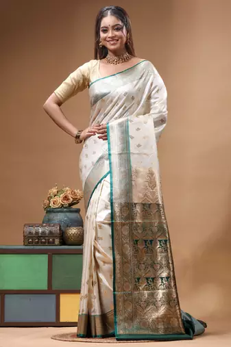 Off-white katan silk saree with gold zari woven border & green contrasting border