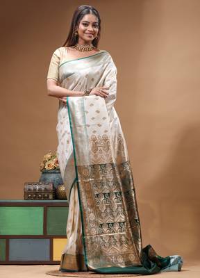 Off-white katan silk saree with gold zari woven border & green contrasting border 3