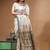 Off-white katan silk saree with gold zari woven border & green contrasting border