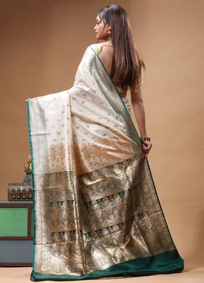 Off-white katan silk saree with gold zari woven border & green contrasting border 4