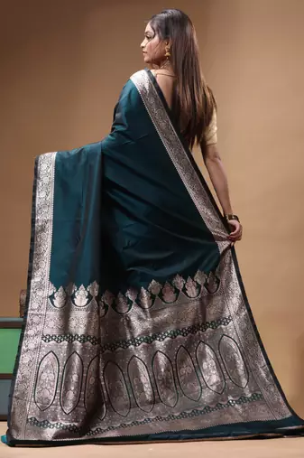 Deep teal katan silk saree with silver zari banarasi border & woven pallu