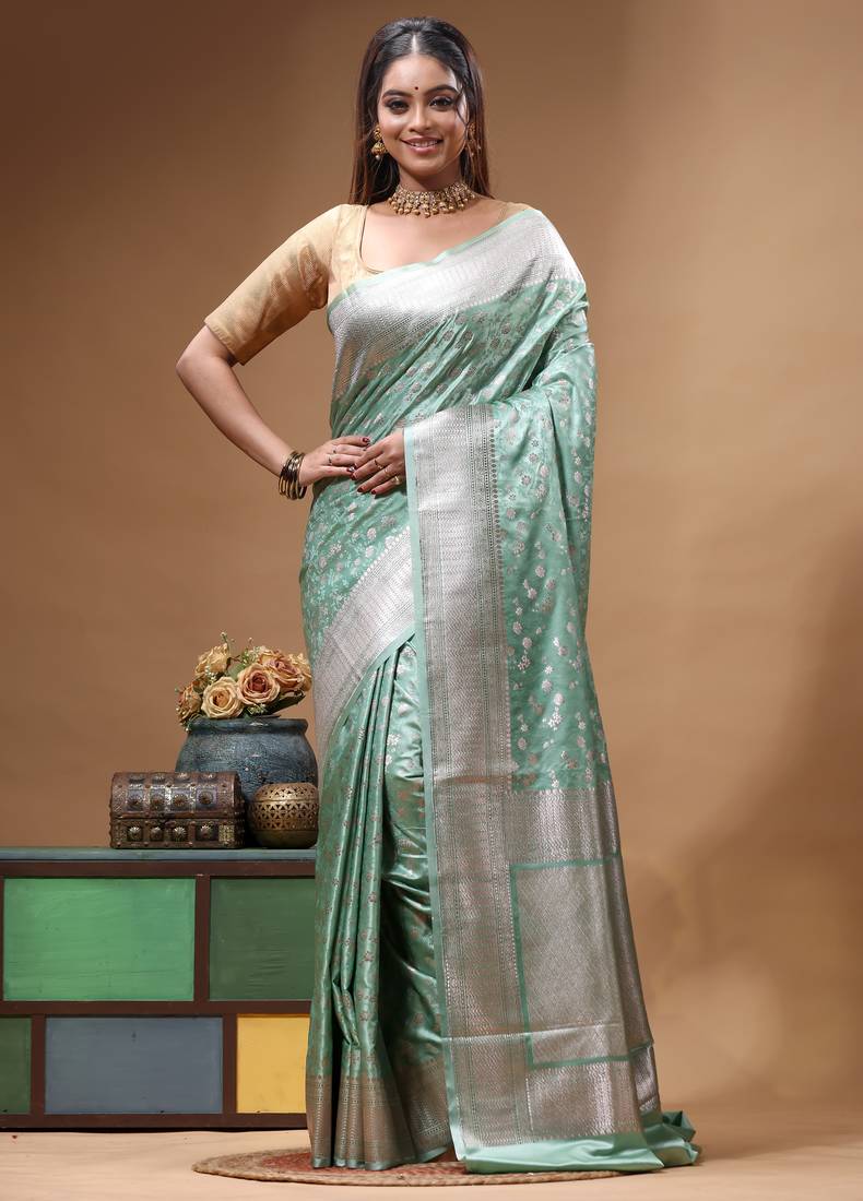 sea green mashru silk blend saree with silver zari weaving & woven border