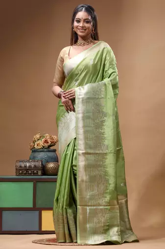 green crepe saree with desighner varanasi ghat theme zari border