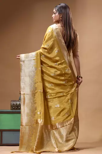 gold crepe saree with desighner varanasi ghat theme zari border