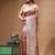 rose gold crepe saree with desighner varanasi ghat theme zari border