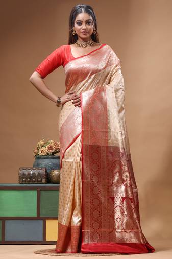 Beige katan silk saree with red & golden zari woven motifs border