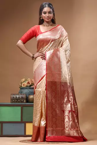 Beige katan silk saree with red & golden zari woven motifs border