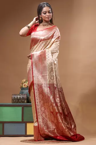 Beige katan silk saree with red & golden zari woven motifs border
