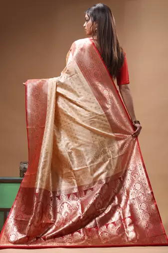 Beige katan silk saree with red & golden zari woven motifs border