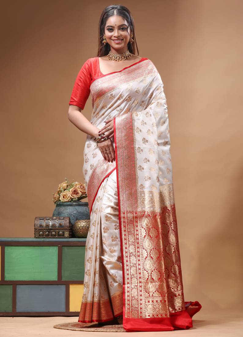 Off-white katan silk saree with gold zari woven border & red contrasting border