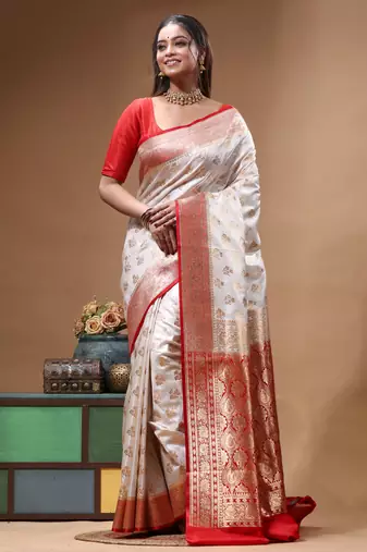 Off-white katan silk saree with gold zari woven border & red contrasting border