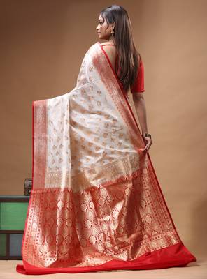 Off-white katan silk saree with gold zari woven border & red contrasting border 3