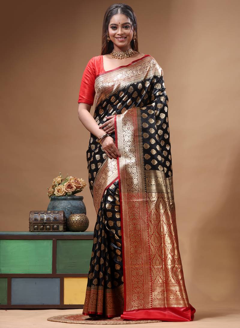 Black katan silk saree with golden zari woven border & buti design
