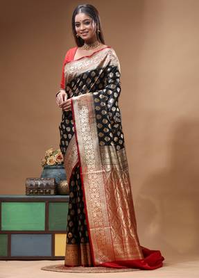 Black katan silk saree with golden zari woven border & buti design 2