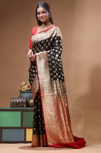Black katan silk saree with golden zari woven border & buti design