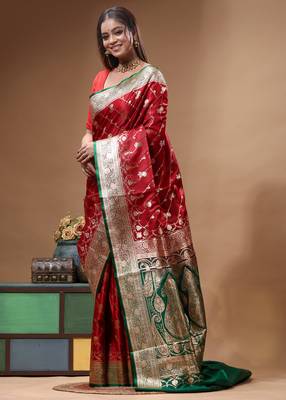 Red & green katan silk saree with zari woven border & traditional floral design 2