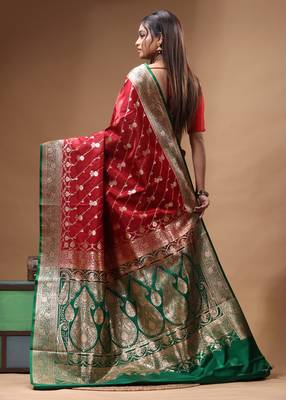 Red & green katan silk saree with zari woven border & traditional floral design 3